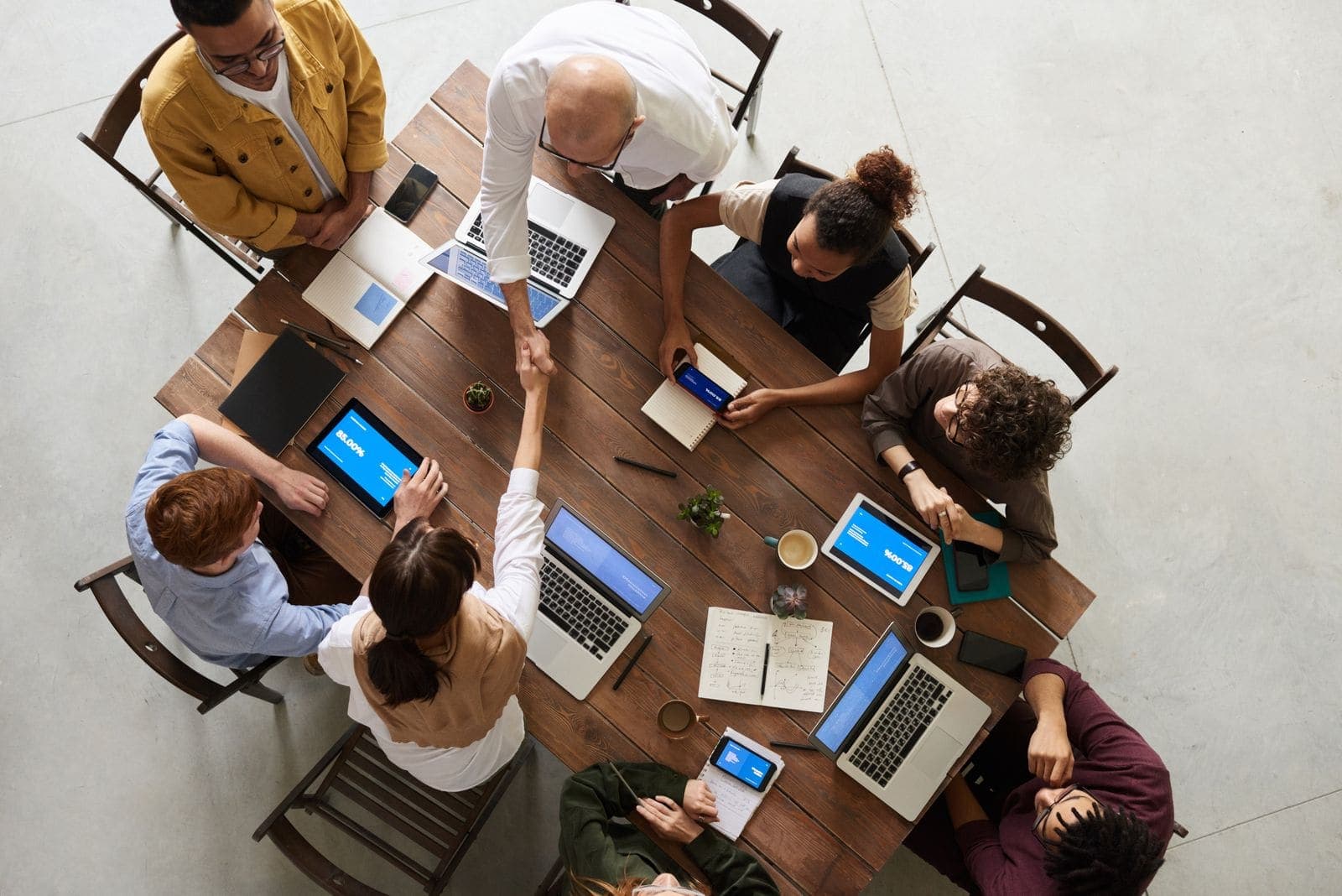 Connected EOS leadership workspace showing Rocks, scorecards and meetings
